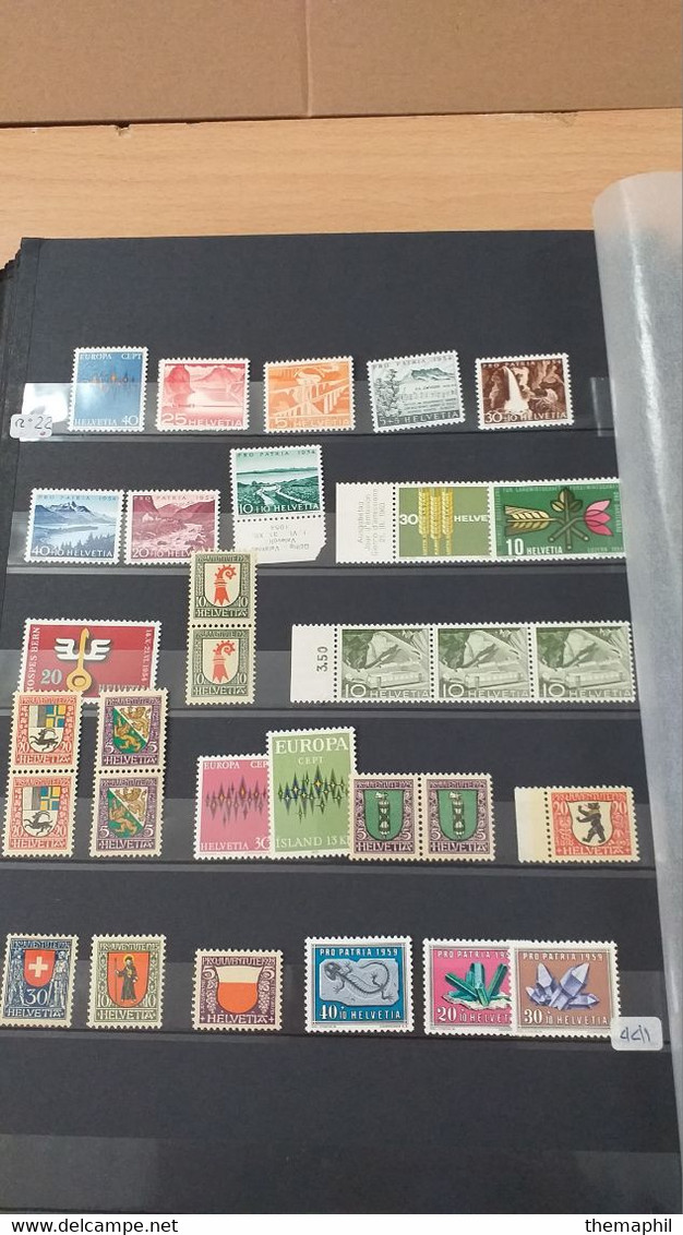 lot n° TH 1205 SUISSE importante collection dans un gros classeur nombreux neufs xx et obl.