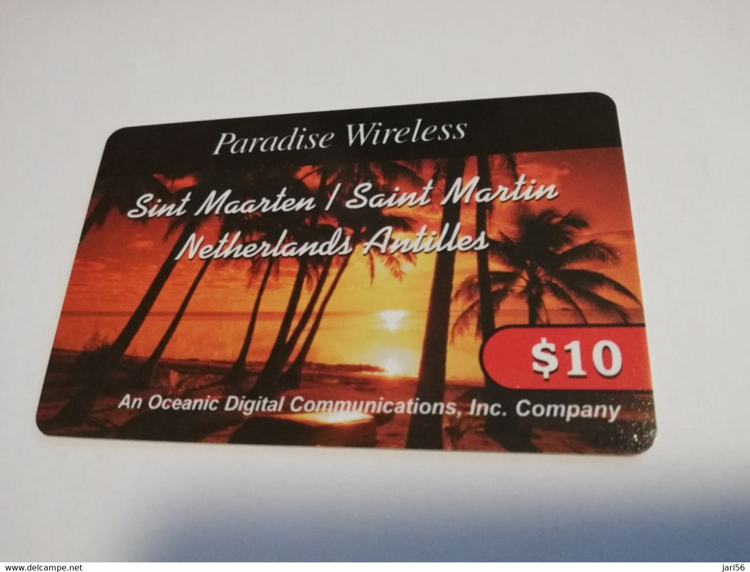 St MAARTEN  Prepaid  $10,- PARADISE WIRELESS PALM TREES SUNSET       Fine Used Card  **4072** - Antilles (Netherlands)