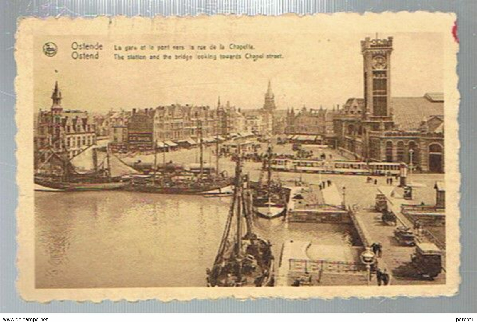 JM24.12 /  CPA /  OSTENDE - LA GARE ET LE PONT VERS LA RUE DE LA CHAPELLE - Oostende