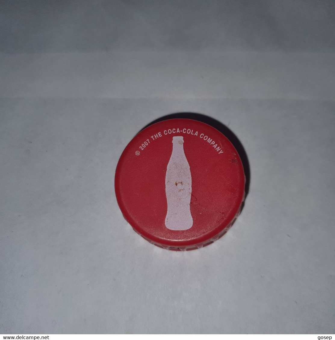 Capsules-(d)-coca Cola Plastic-(lokking Out Side)-used - Other & Unclassified