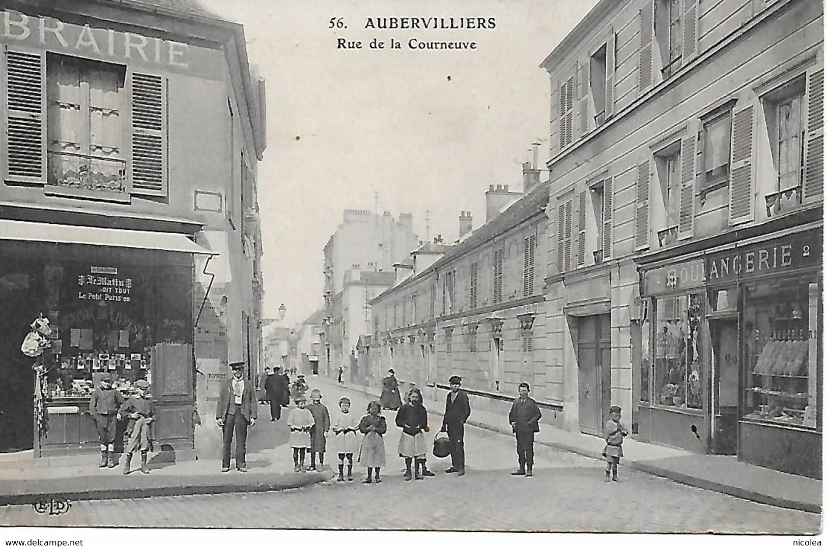 93 - AUBERVILLIERS - RUE DE LA COURNEUVE - BELLE CPA ANIMEE EN  BON ETAT - PLAN RARE !  LIBRAIRIE ,BOULANGERIE - Aubervilliers