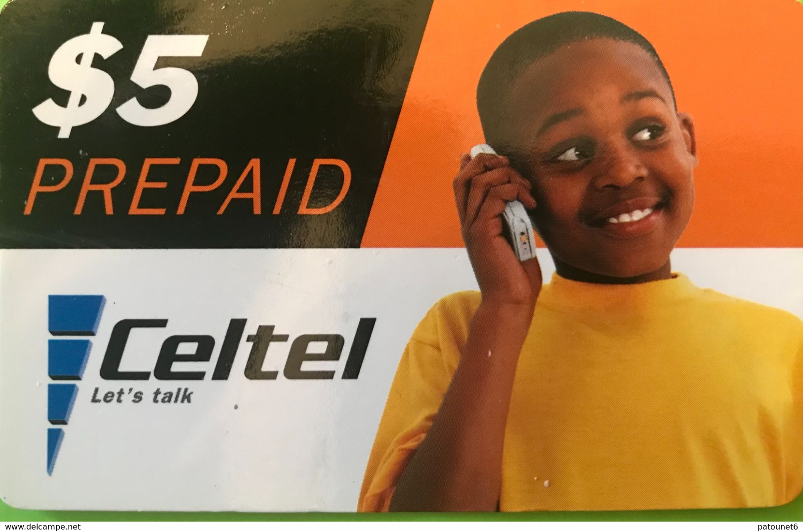 ZAMBIE  -  Prepaid  - Celtel - Youg Man With Phone  -  $ 5 - Zambia