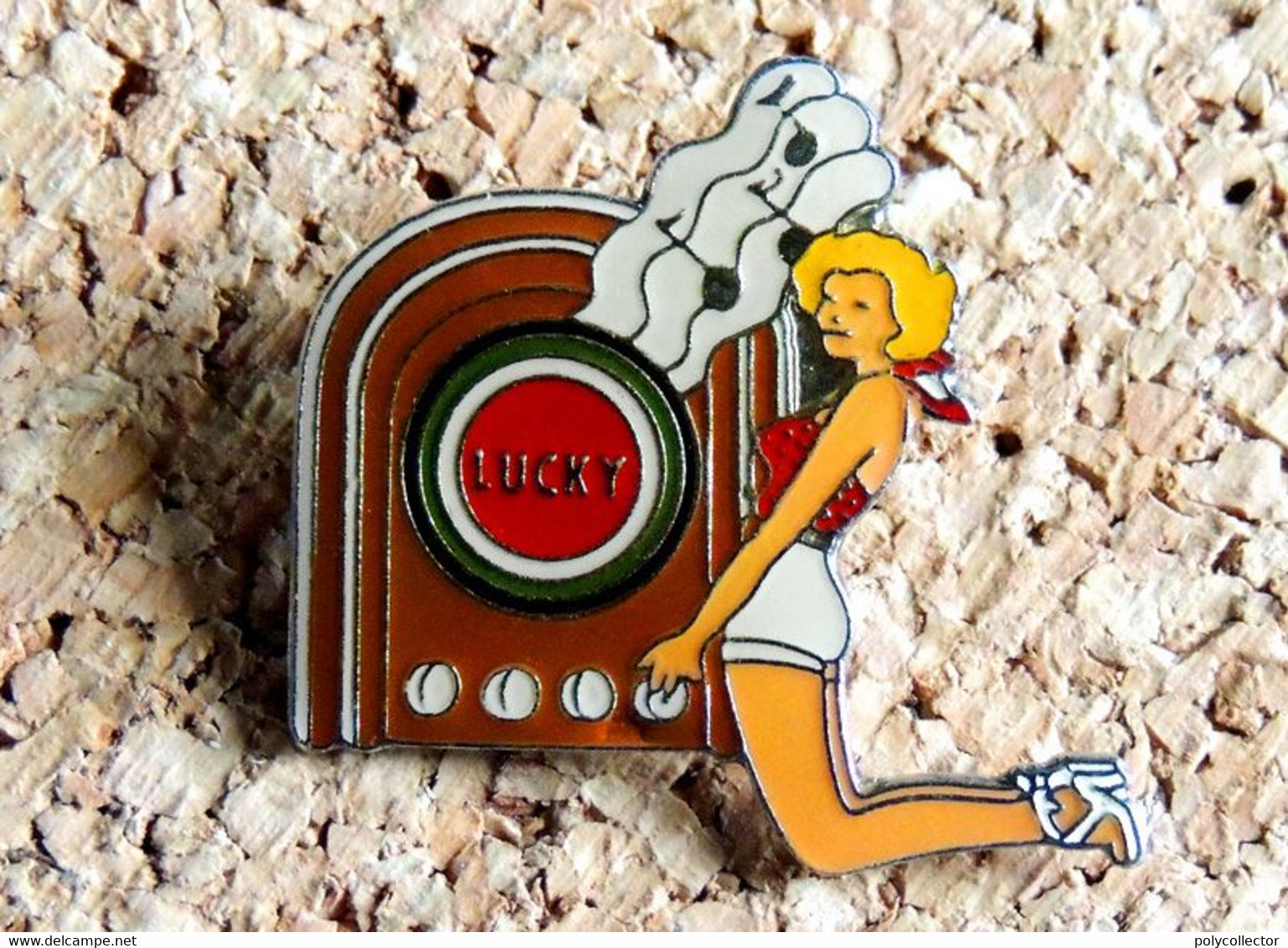 Pin's PIN-UPS - Cigarettes LUCKY STRIKE Radio TSF - Verni époxy - Fabricant EOLE - Pin-ups