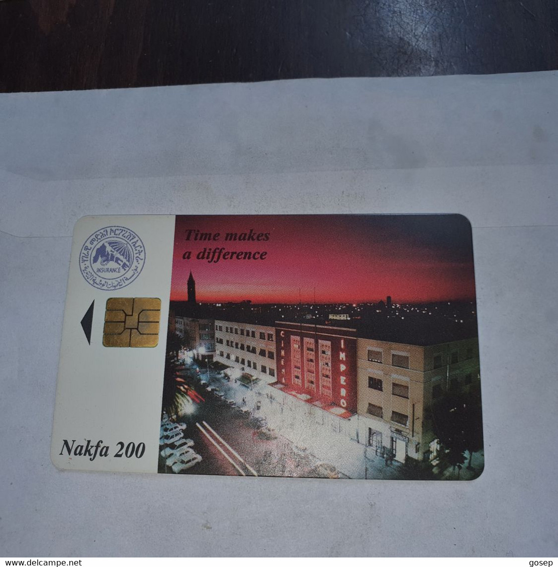 Eritrea-time Makes A Difference(nakfa 200)(9)-(0400-004399)-(lokking From Chip Other)-used Card Chip+1 Card Prepiad Free - Eritrea