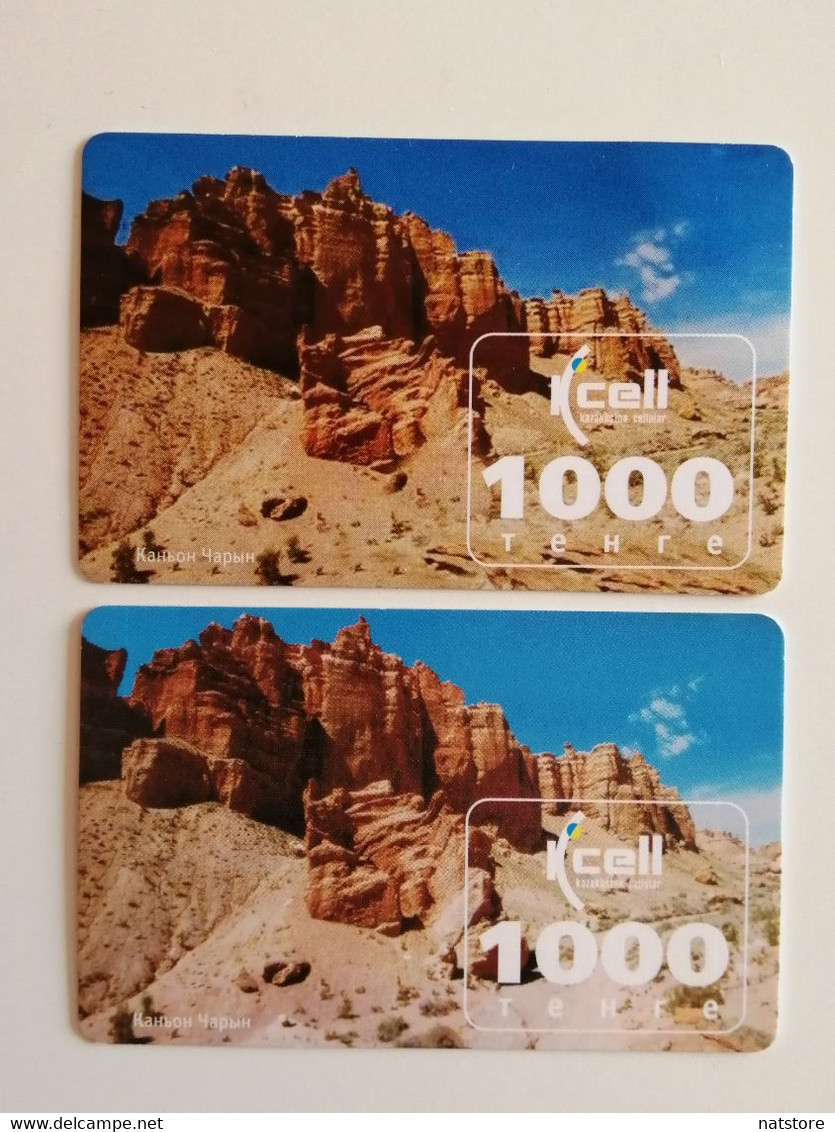 KAZAKHSTAN..LOT OF 2 PHONECARDS.. KCELL..1000 TENGE..CANYON CHARYN - Montañas