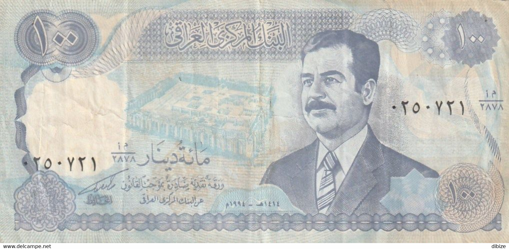 Billet De Banque Usagé. Iraq. 100 Dinars. 1994. Effigie De Saddam Hussain. Phare. Etat Moyen. Petite Déchirure. - Iraq