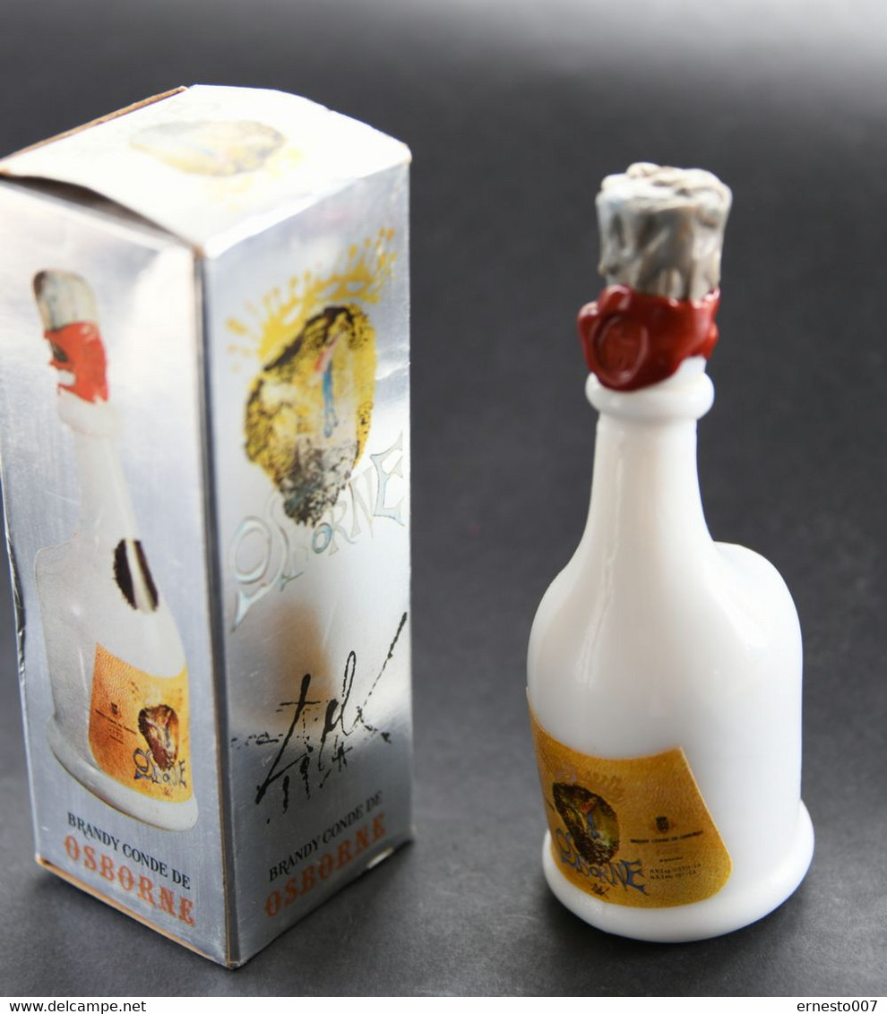 50CL FLASCHE BRANDY CONDE DE OSBORNE ENTWORFEN VON SALVADOR DALI IM ORIGINAL-KARTON, DIE FLASCHE IST GEFÜLLT, VON1970/80 - Spiritueux