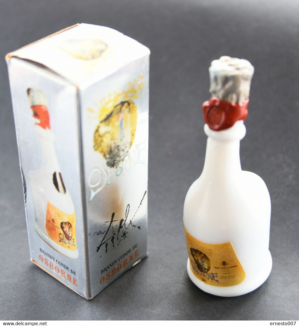 50CL FLASCHE BRANDY CONDE DE OSBORNE ENTWORFEN VON SALVADOR DALI IM ORIGINAL-KARTON, DIE FLASCHE IST GEFÜLLT, VON1970/80