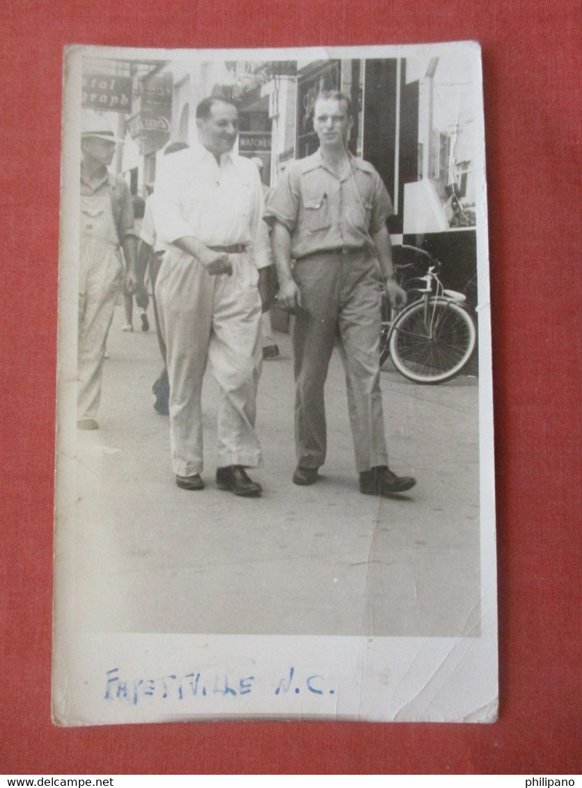 RPPC  Men Walking Street View   North Carolina > Fayetteville     Ref  4878 - Fayetteville