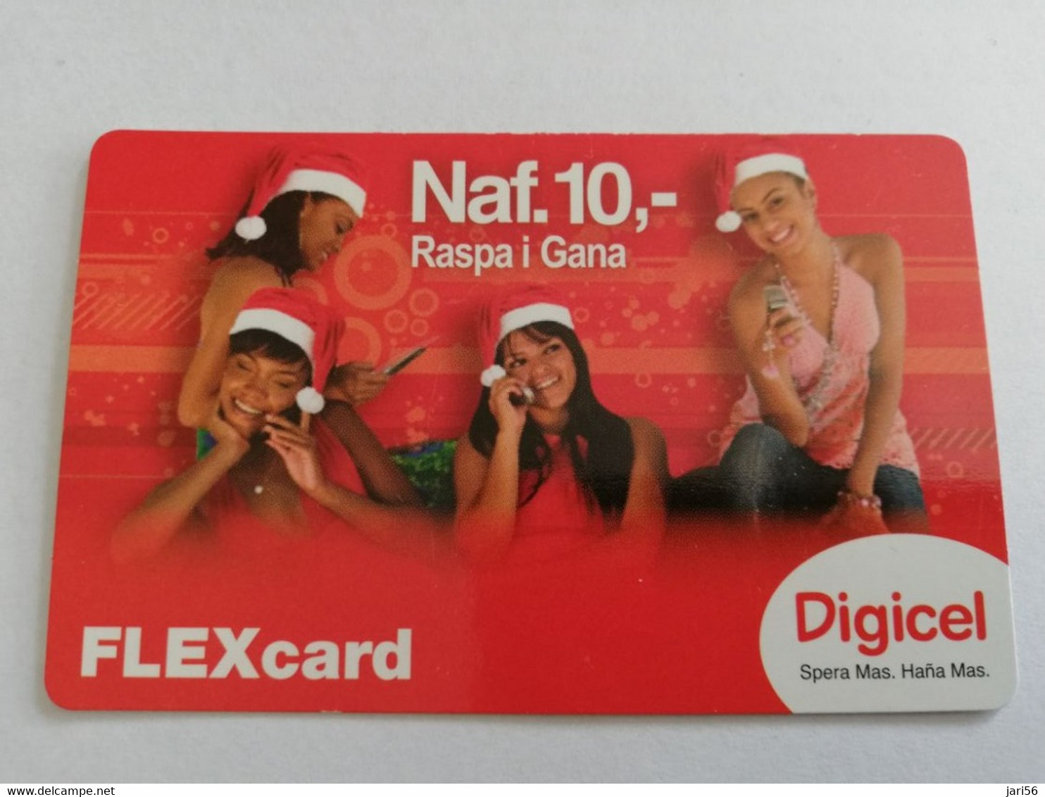 CURACAO  DIGICEL FLEX CARD  NAF 10,-  CHRISTMAS LADYS WITH PHON   DATE 05/09/2009   VERY FINE USED CARD     ** 5293AA** - Antilles (Netherlands)