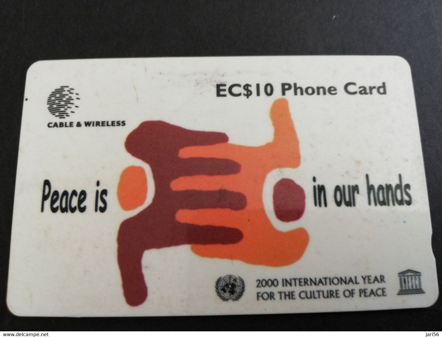 ST LUCIA    $ 10  CABLE & WIRELESS   PEACE IN OUR HANDS   338CSLB   Fine Used Card ** 5305** - St. Lucia