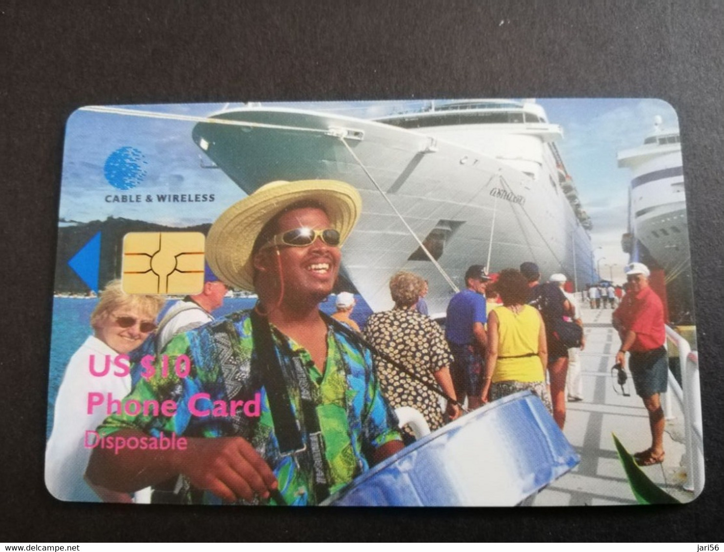 BRITSCH VIRGIN ISLANDS  US $ 10,--  CHIP CARD  Men On Steel Drum By Cruise Ship TEXT ON BACK SIDE   **5322** - Isole Vergini