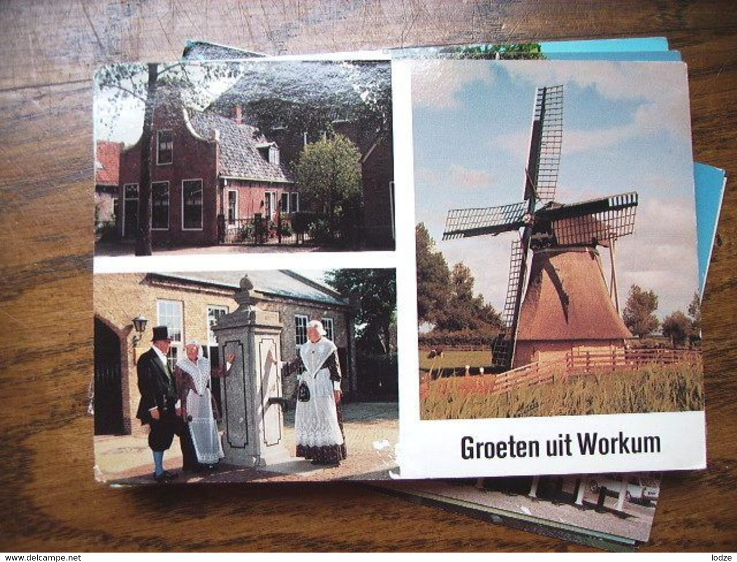 Nederland Holland Pays Bas Workum Met Pomp, Klederdracht En Molen - Workum