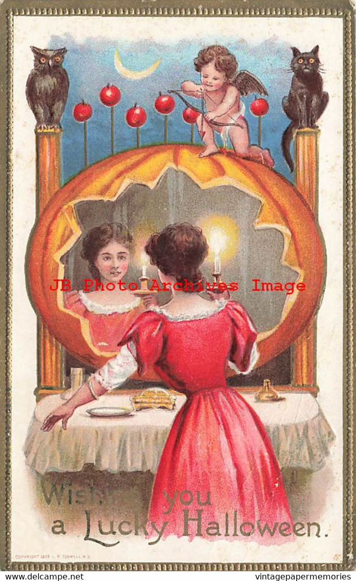 325367-Halloween, LR Conwell No 245, Woman With Candle Reflects In Pumpin Frame - Halloween