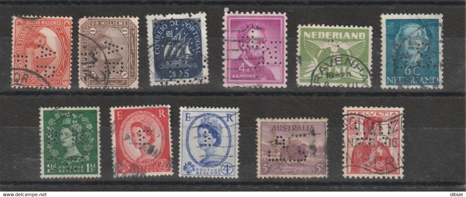 11 Timbres Perforés. 2 Egyptien. 1 Portugais. 1 Des Etats-Unis. 2 Hollandais. 3 Du Royaume Uni.  1 Australien. 1 Suisse. - Perfins