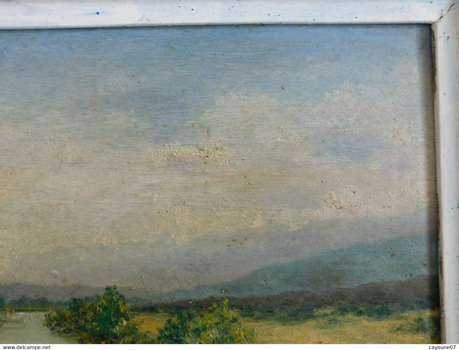 R. DUBÈS (XXème) huile sur panneau "Paysage de rivière et montagne " encadrée
