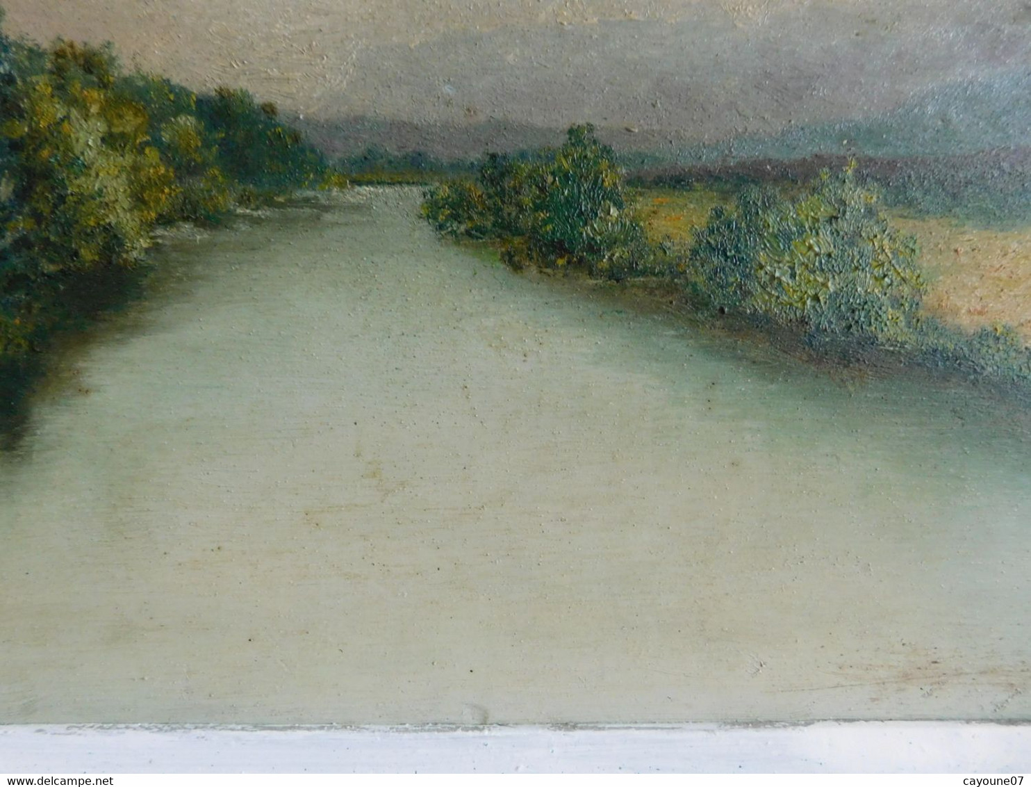 R. DUBÈS (XXème) huile sur panneau "Paysage de rivière et montagne " encadrée