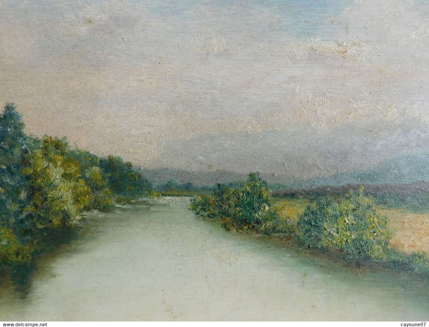 R. DUBÈS (XXème) huile sur panneau "Paysage de rivière et montagne " encadrée