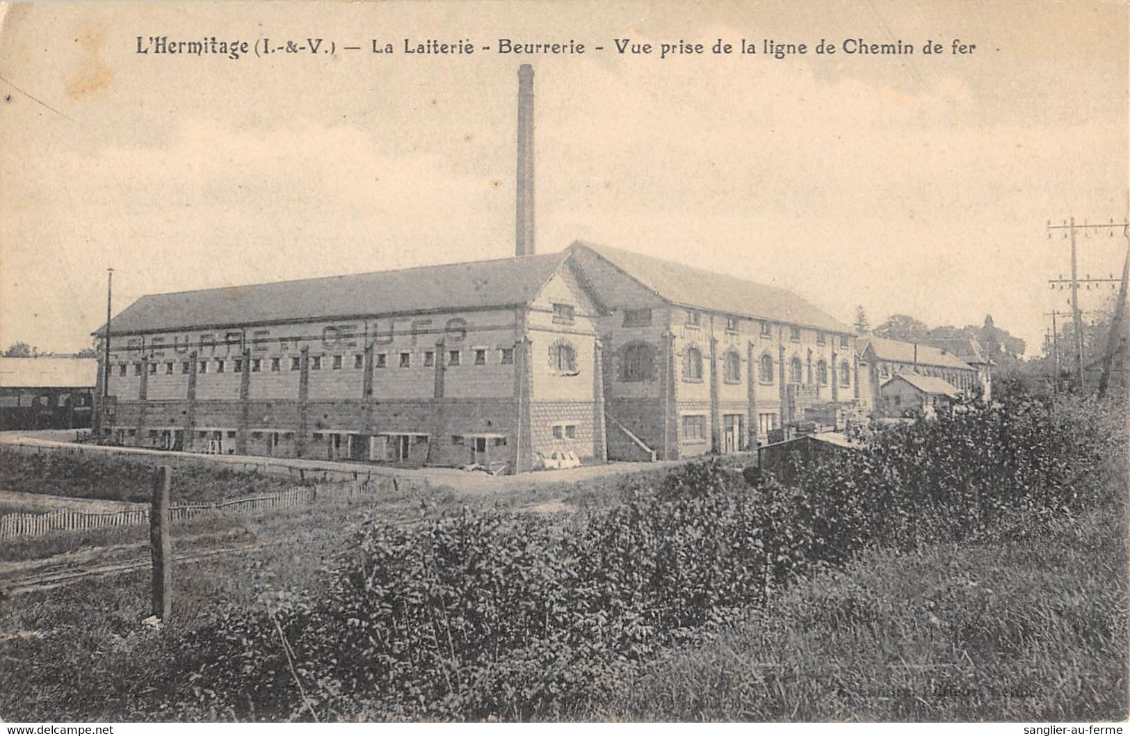 CPA 35 L'HERMITAGE LA LAITERIE BEURRERIE VUE PRISE DE LA LIGNE DU CHEMIN DE FER - Andere & Zonder Classificatie