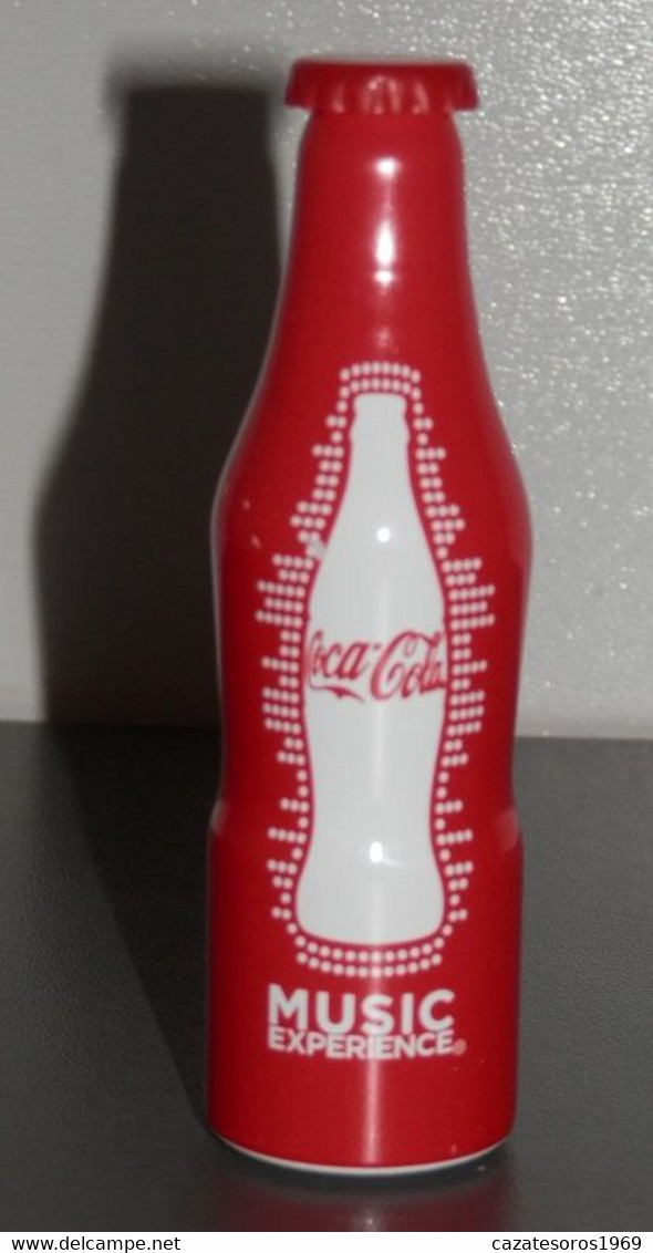 UNE MINI BOUTEILLE DE LE   COCA-COLA  DE SPAIN - Flessen