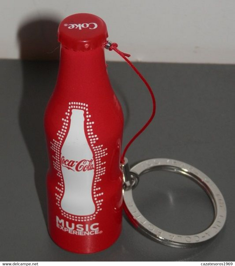 UNE MINI BOUTEILLE DE LE   COCA-COLA  DE SPAIN - Flessen