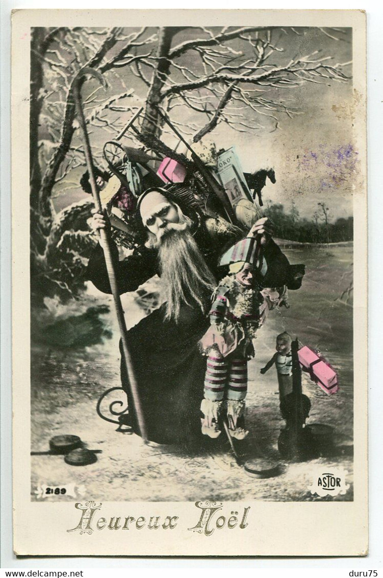 CPA Glacée 1911 * HEUREUX NOËL * Père Noël St Nicolas En Manteau Noir Hotte De Jouets Et Arlequin Polichinelle En Main - Santa Claus