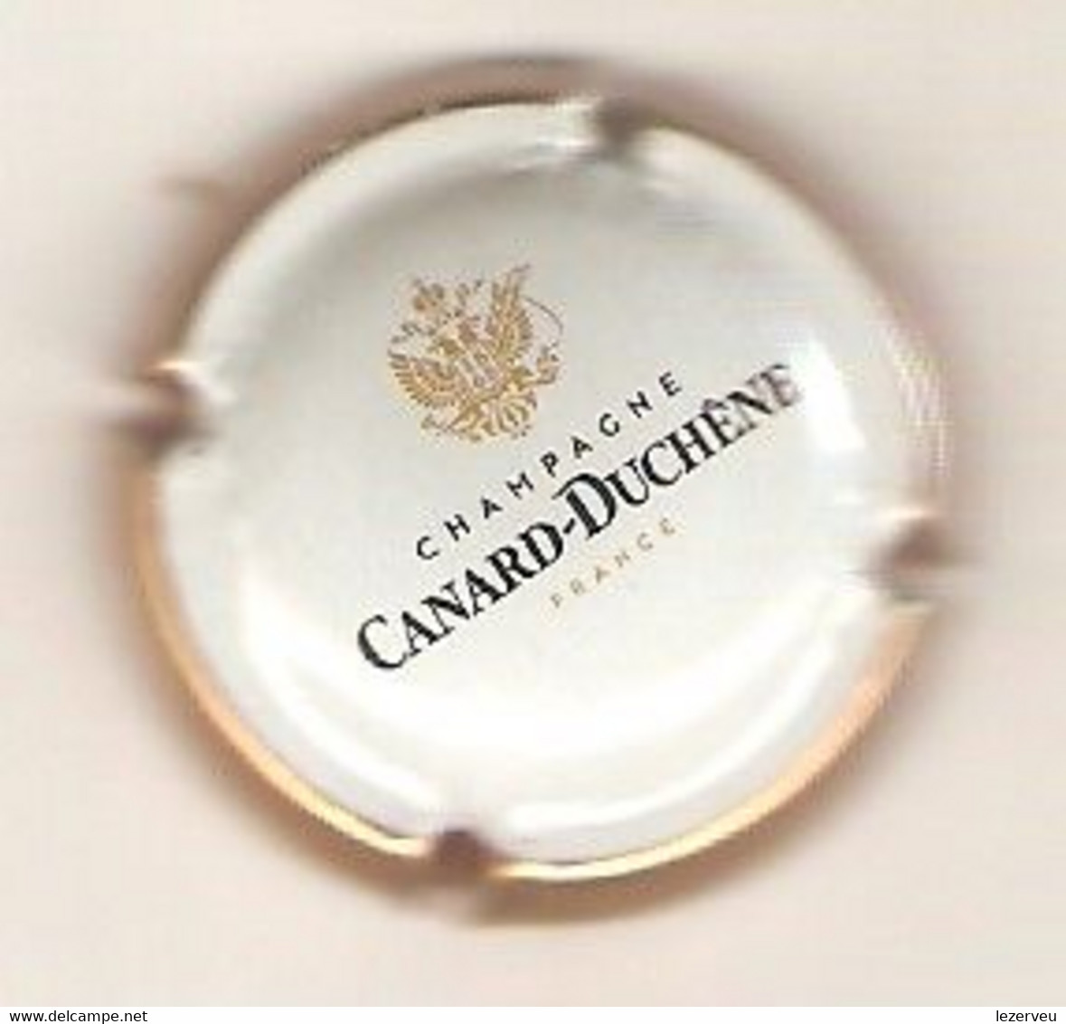 CAPSULE DE MUSELET CHAMPAGNE CANARD DUCHENE  (noir Et Or Sur Blanc,contour Doré) - Canard Duchêne