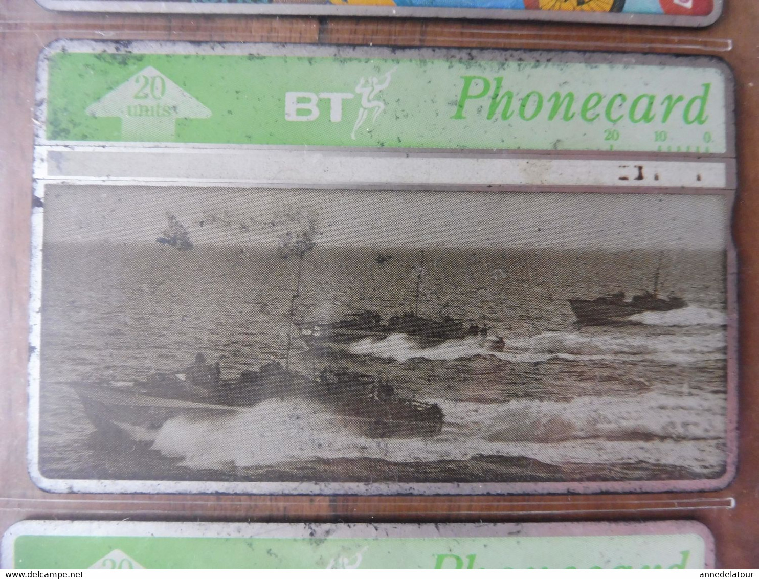 10 télécartes (cartes téléphoniques) BT PHONECARD dont 4 unités  D-Day Follow-up waves landing on Gold Beach from an LCI