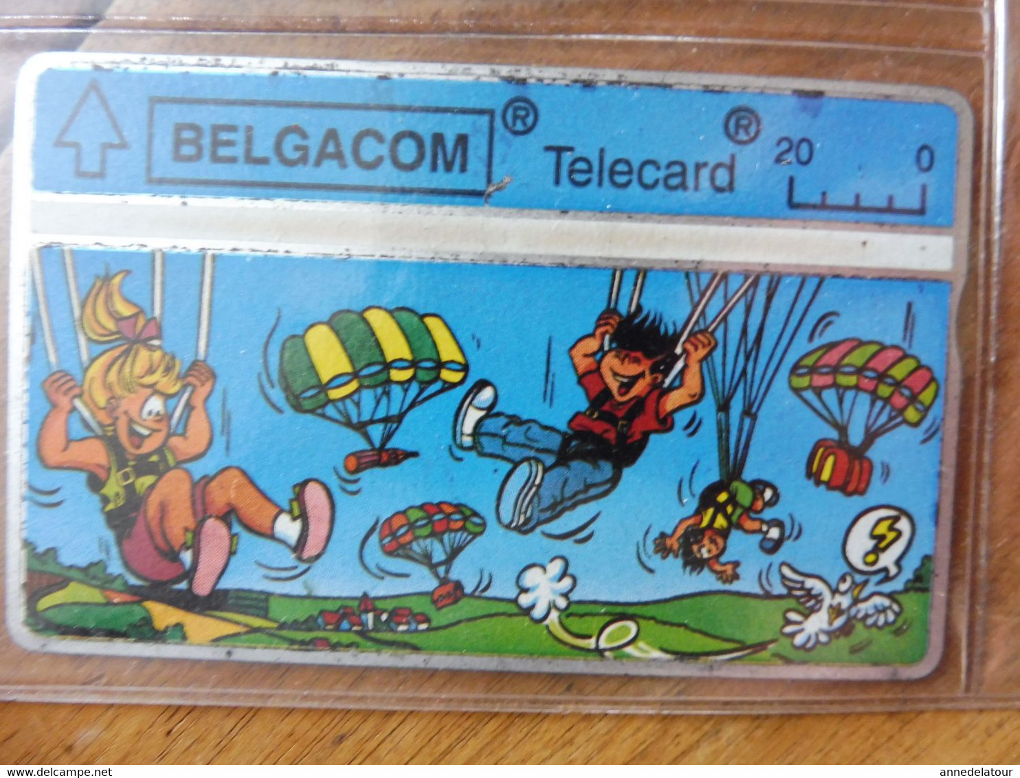 8 télécartes (cartes téléphoniques)  BELGACOM  avec (publicité ,dessins animés, etc) Belgique