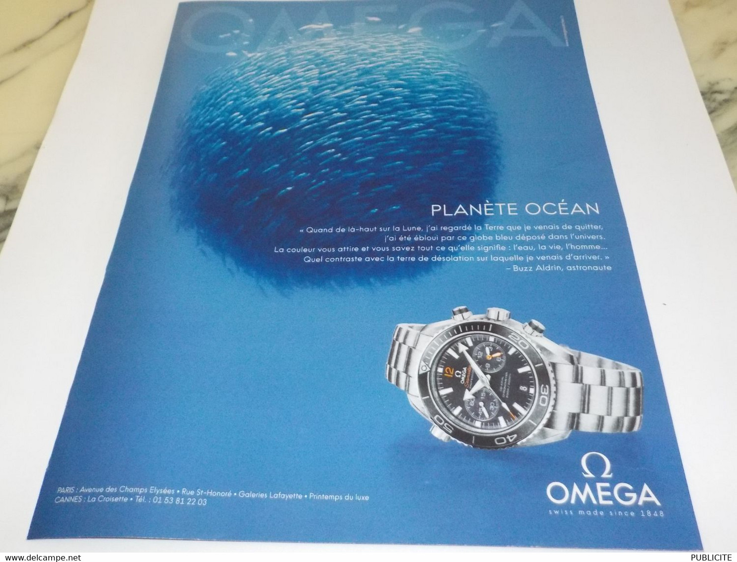 ANCIENNE PUBLICITE PLANETE OCEAN  MONTRE OMEGA 2011 - Orologi Da Muro