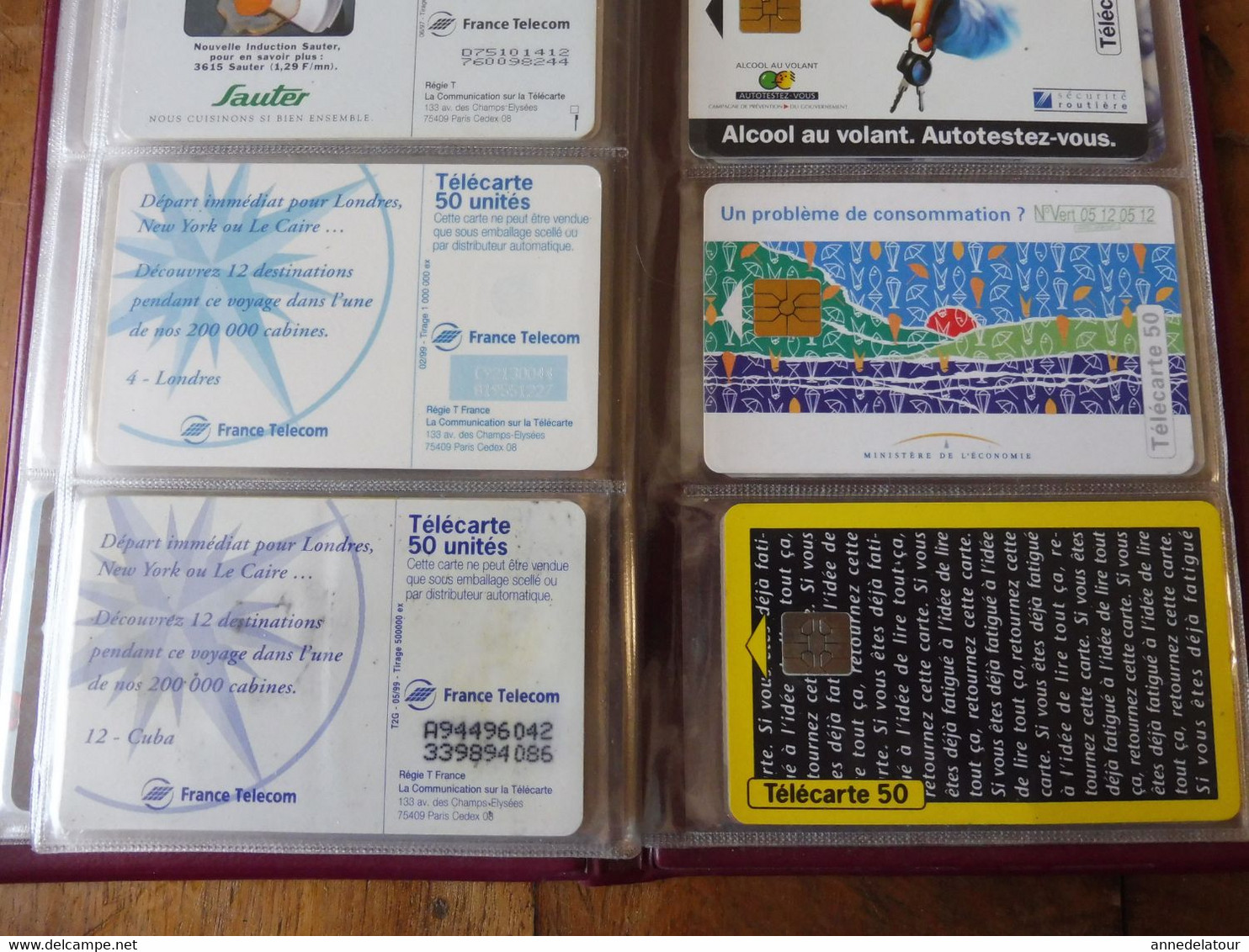 Lot de 48 TELECARTES (Cartes téléphoniques) diverses dans son classeur a pochettes