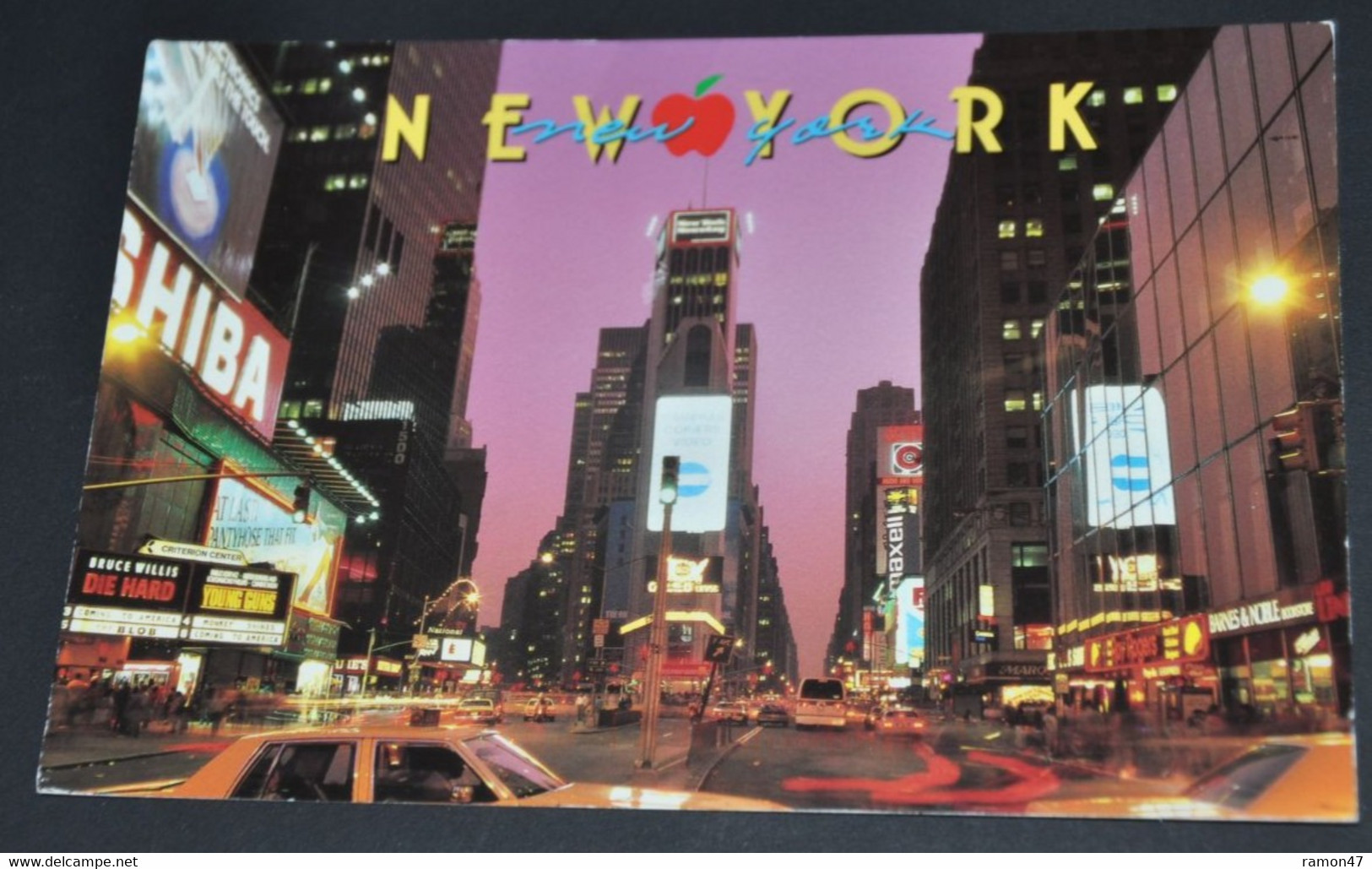 New York - Times Square In New York, A Building Center Of Neon Signes, Yellow Cabs And Billboards - Time Square