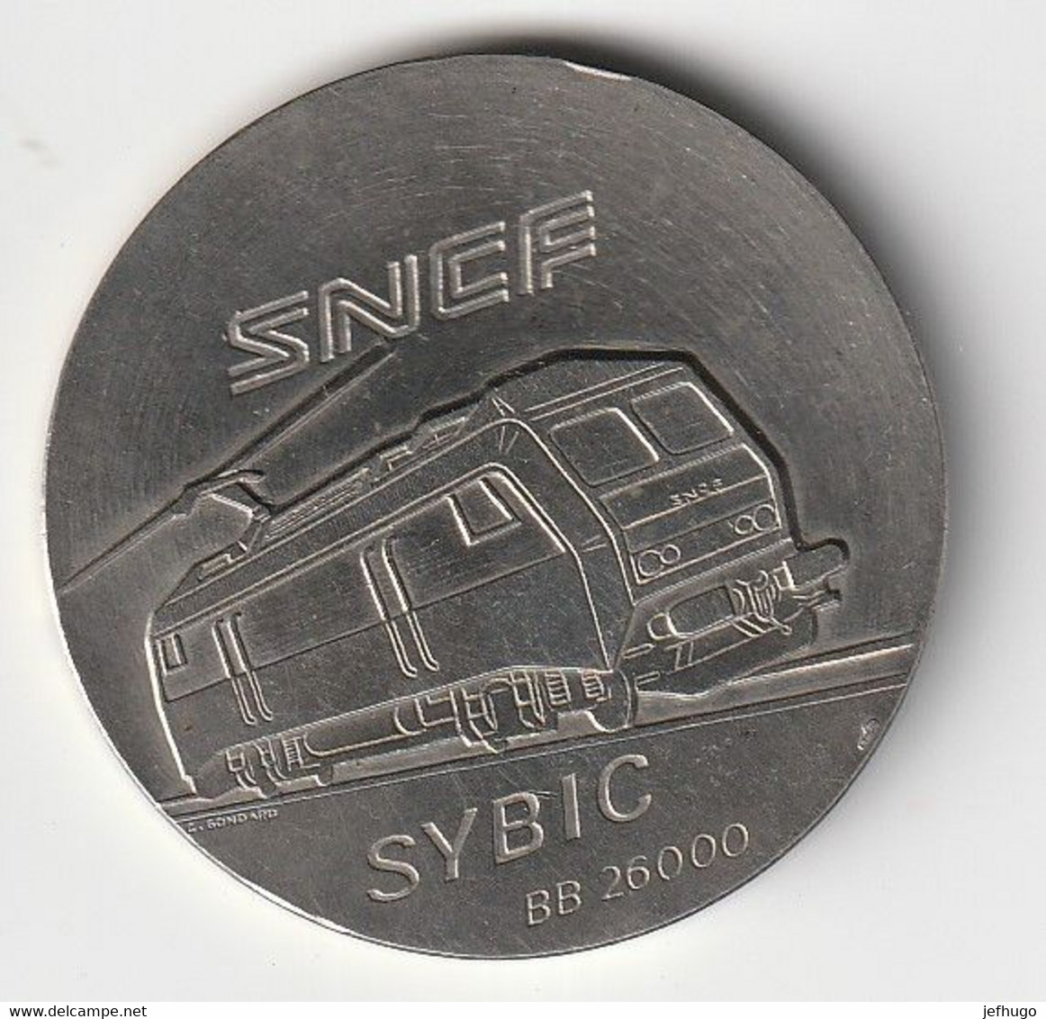 MEDAILLE METAL SNCF SYBIC BB 26000 GRAVEUR GONDARD ? DIAMETRE 42 MM . POIDS 36 GRAMMES - Profesionales / De Sociedad