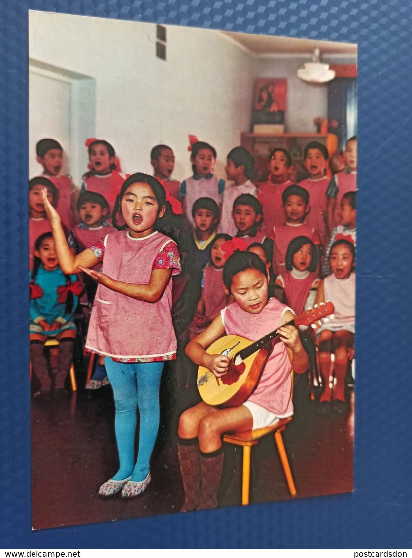 Mongolia. Ulan Bator. Mongolian Kindergarten - Girl Singing - Folk String Instrument - Mongolië