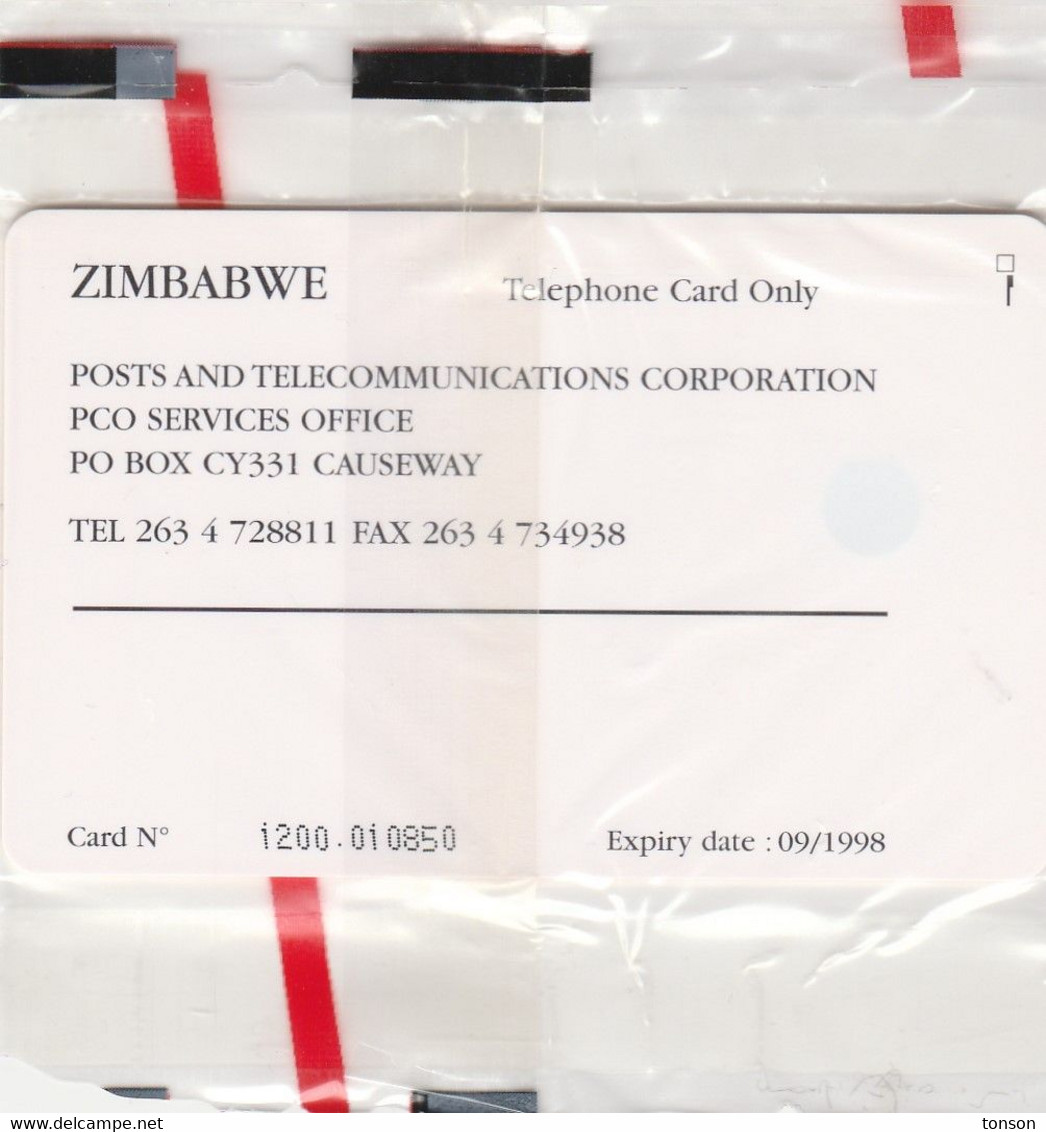 Zimbabwe, ZIM-04, $50, 6th All Africa Games - Orange, Mint In Blister, 2 Scans.    Chip : GEM2 (Black/Grey) - Zimbabwe