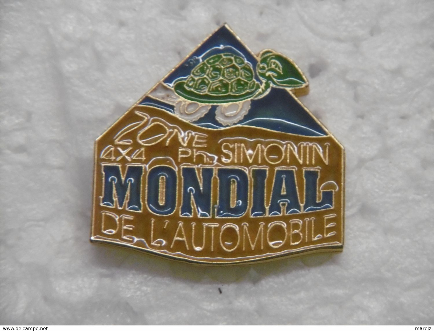 Pin's - Automobiles 4X4 MONDIAL DE L'AUTOMOBILE Zone PH. Simonin - Pin Badge Turtle Animal Tortue à Roulettes - Other & Unclassified