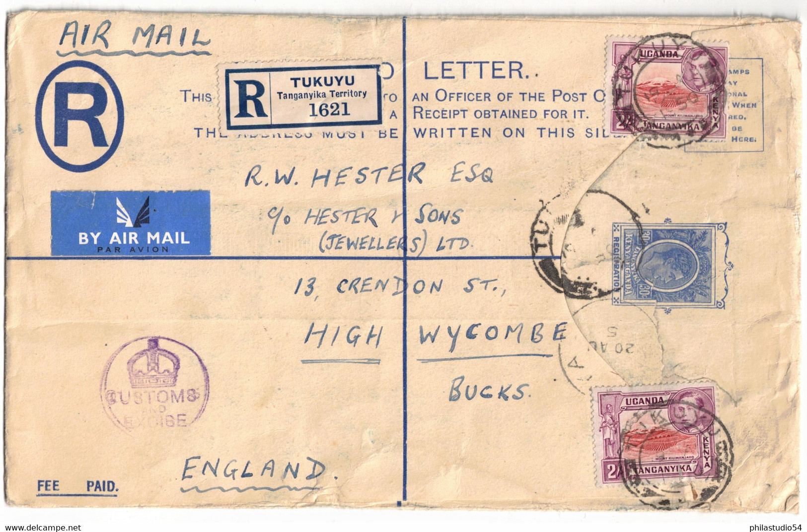 1950, Registered Stationery Envelope (20 X 12,4 Cm) With Additional Franking To England - Tanganyika (...-1932)