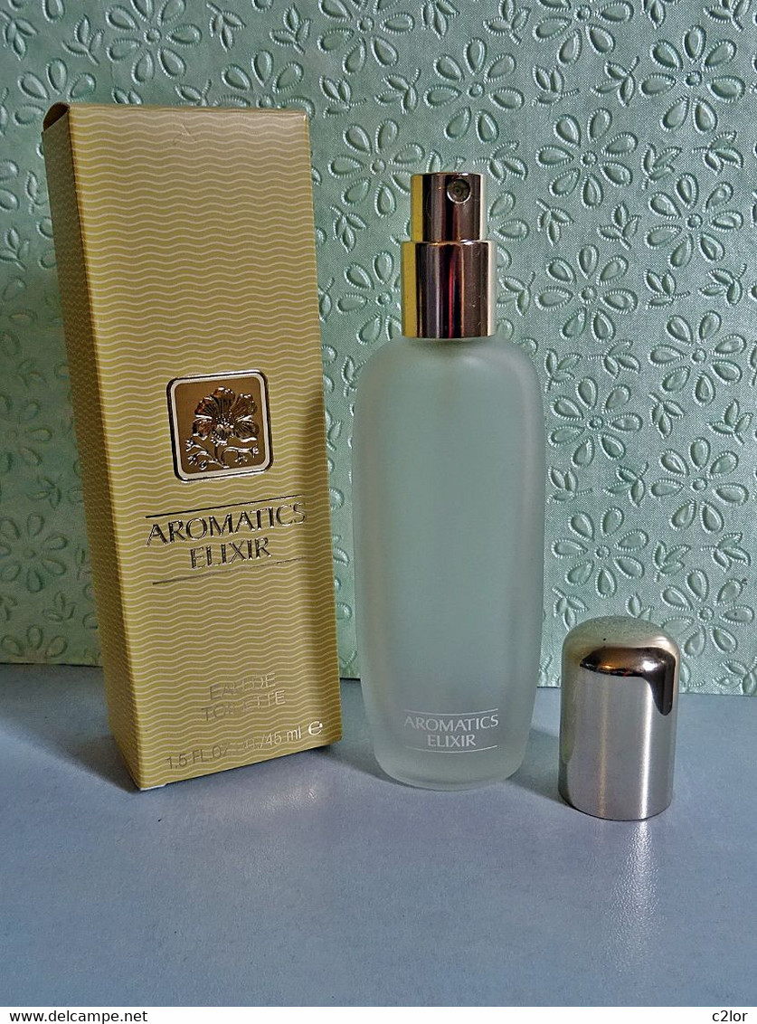 Flacon Spray  " AROMATIC ELIXIR " De CLINIQUE Eau De Toilette 45 Ml Avec Sa Boite VIDE:EMPTY - Frascos (vacíos)