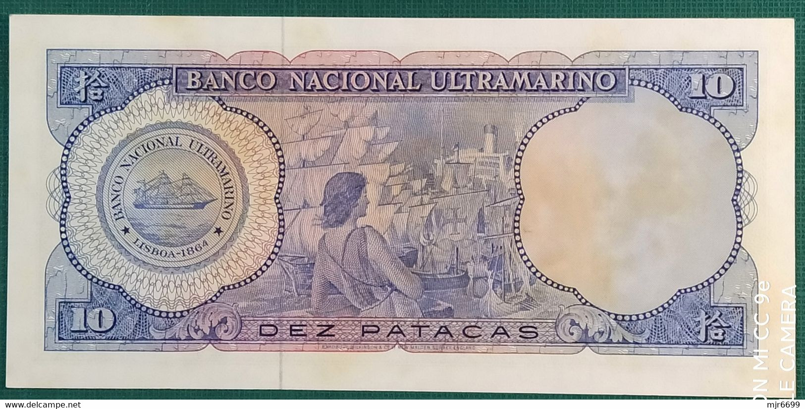 MACAU 1963 BANK NOTE 10 PATACAS UNCIRCULATED BUT TONING ON BACK, SEE PHOTO - Macau