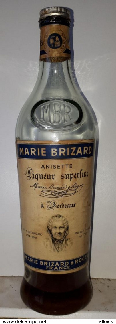 Très Rare Bouteille D'Anisette Marie Brizard De 1955 - Bicentenaire 1755-1955 - Voir L'annonce Et Les Scans. - Alcoolici