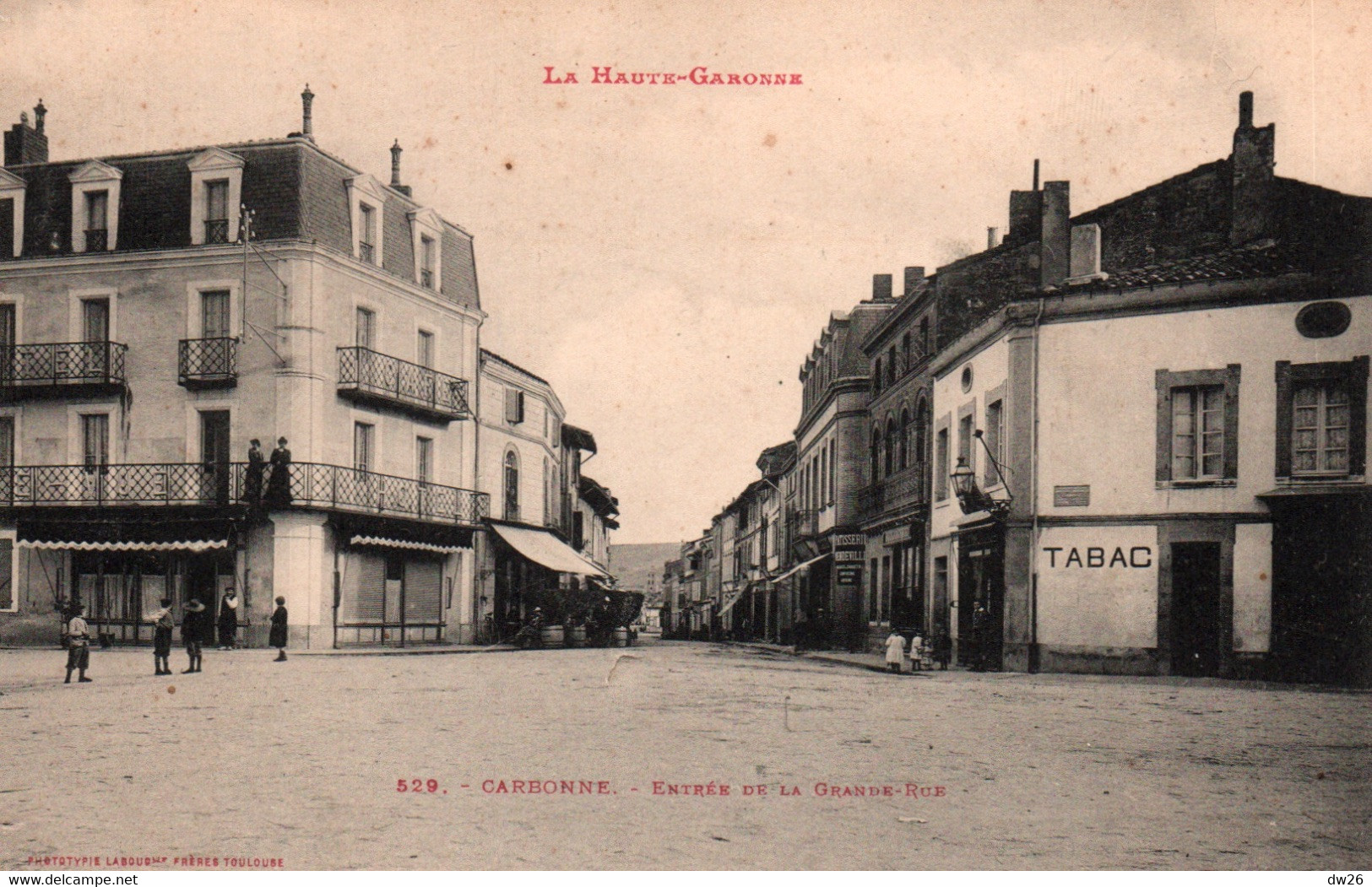 Carbonne (Haute Garonne) Entrée De La Grande Rue, Tabac - Phototypie Labouche Frères - Carte N° 529 - Andere & Zonder Classificatie