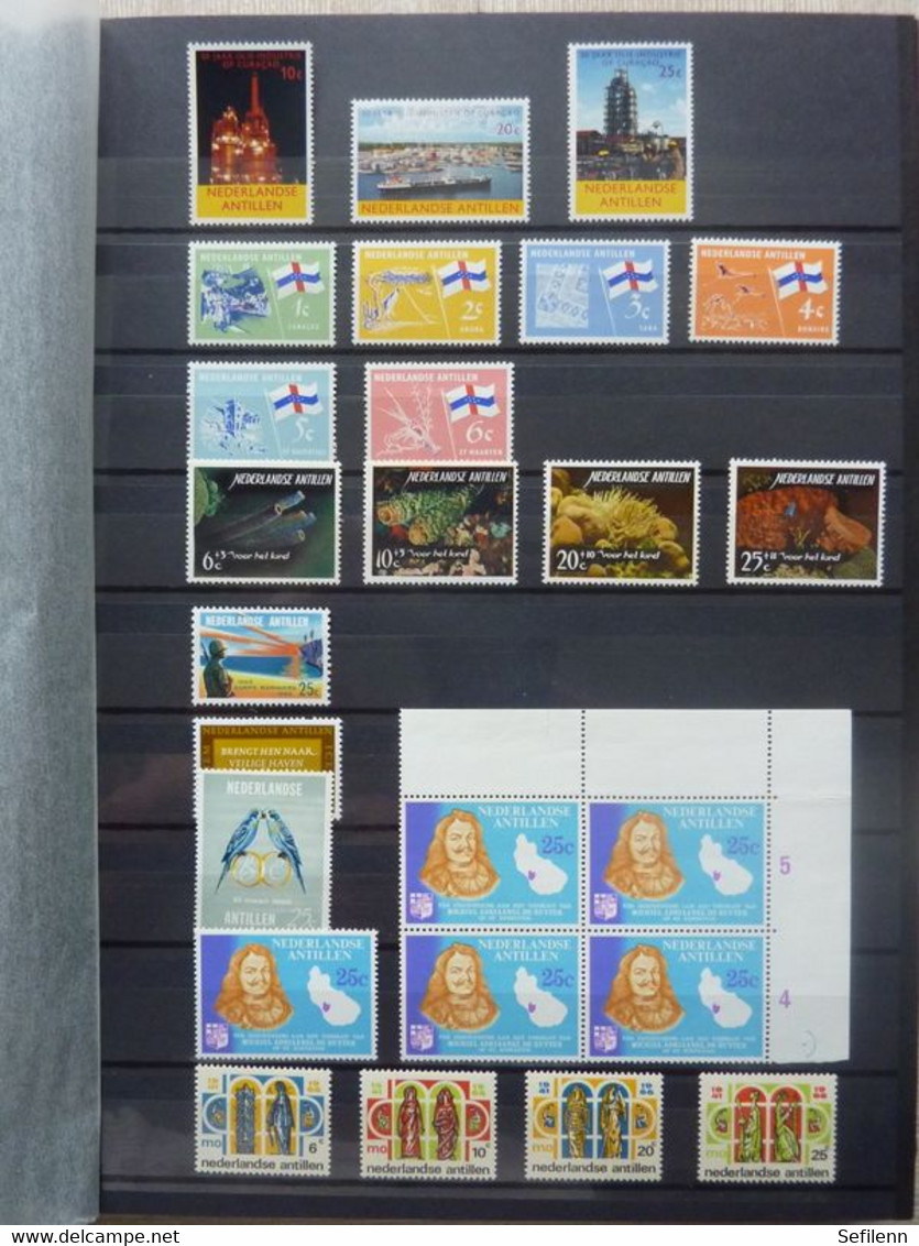 Suriname/Netherlands Antilles(till 1998)/Suriname/Netherlands Indië/Curacao/Netherlands New Guinea in 2 stockbooks