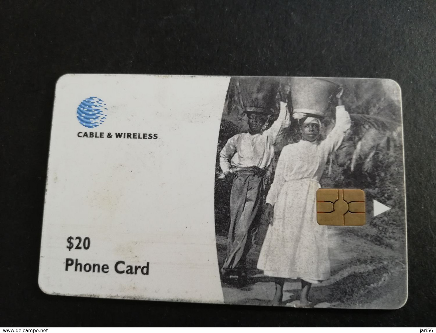 DOMINICA / $20 CHIPCARD  WATER CARRIER          Fine Used Card  ** 6284 ** - Dominique