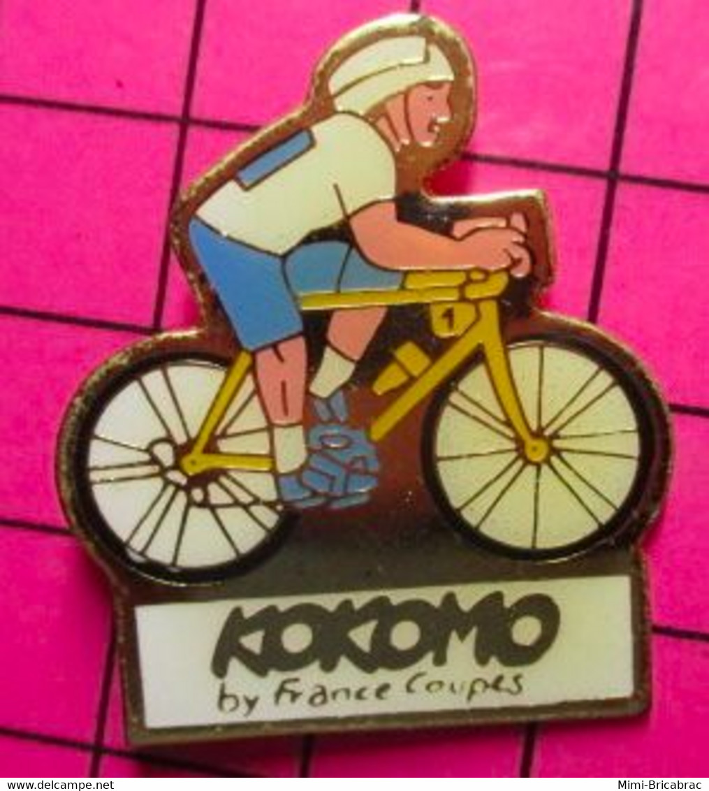 1121 Pin's Pins / Beau Et Rare / THEME : SPORTS / VELO CYCLISTE KOKOMO BY FRANCE COUPES - Cyclisme