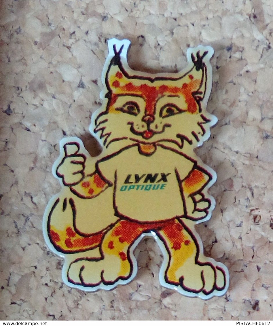 Pin's  LYNX ATARI Optique Mascotte Console Jeu - Jeux