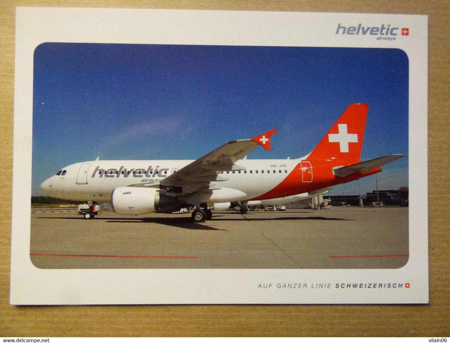 AIRLINE ISSUE / CARTE COMPAGNIE      HELVETIC   AIRBUS A 319-112    HB-IVK - 1946-....: Modern Tijdperk