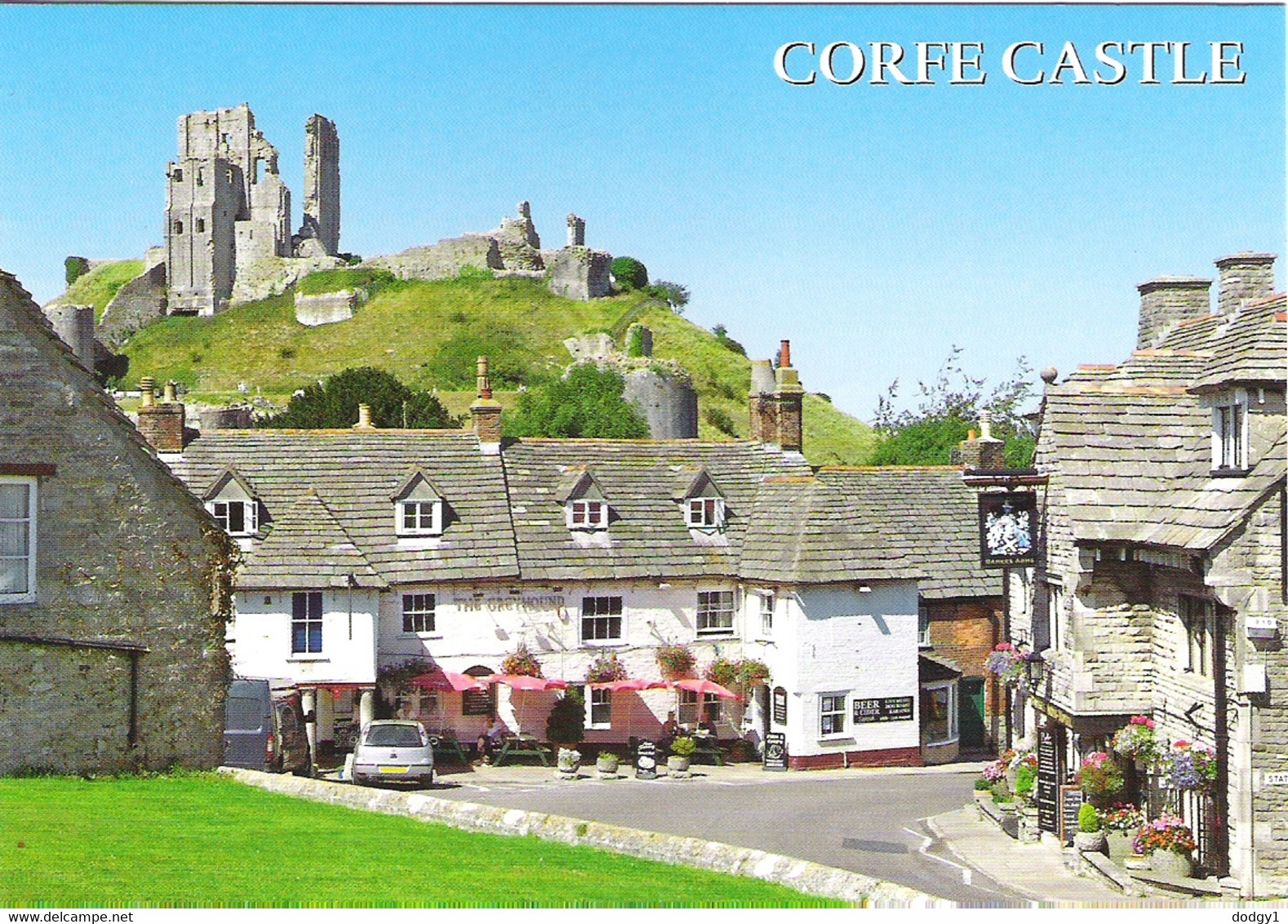 THE CASTLE FROM THE VILLAGE, CORFE CASTLE, DORSET, ENGLAND. UNUSED POSTCARD Ap2 - Swanage