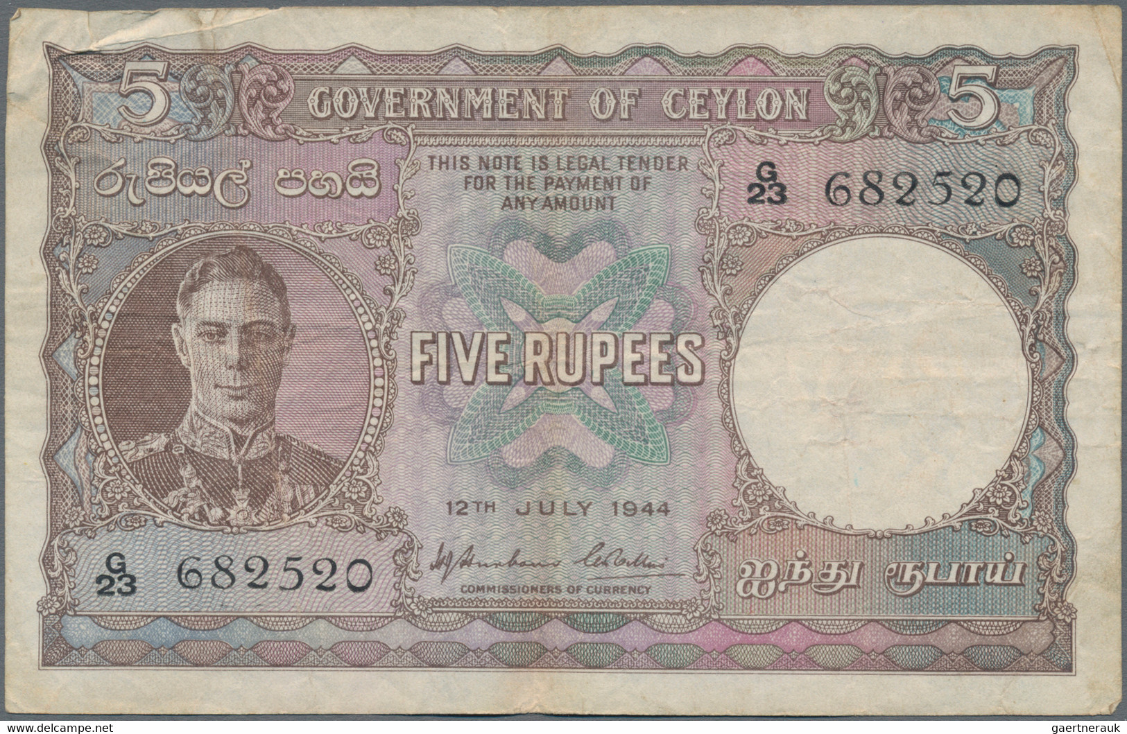 Ceylon: The Government Of Ceylon 5 Rupees 1944, P.36, Several Folds And Creases In The Paper, Lightl - Sri Lanka