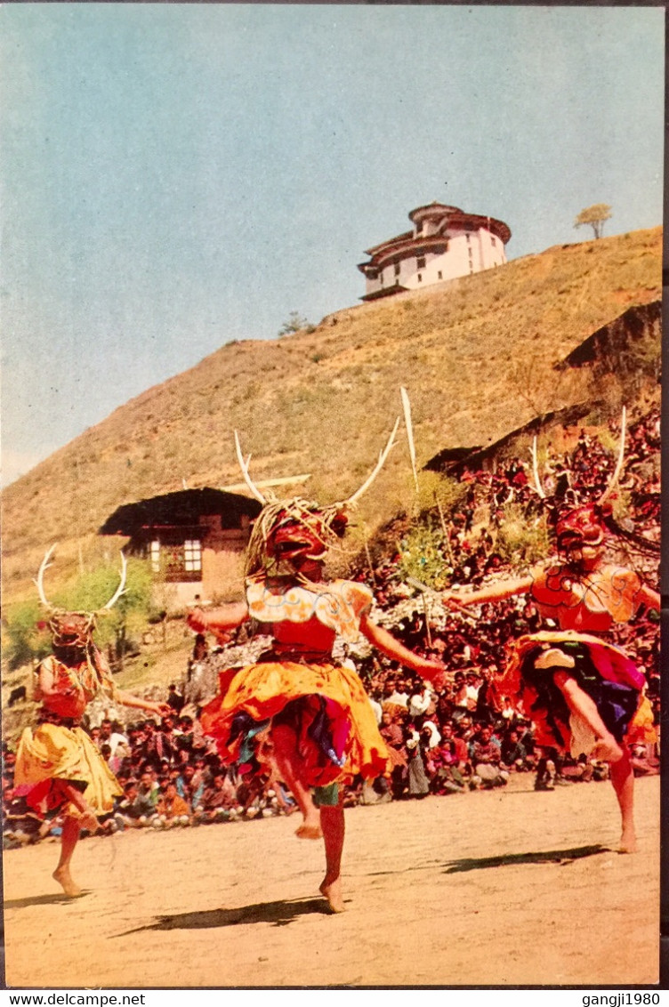 BHUTAN,DEER DANCE,NATIONAL MUSEUM IN THE BACK ROUND - Bhoutan