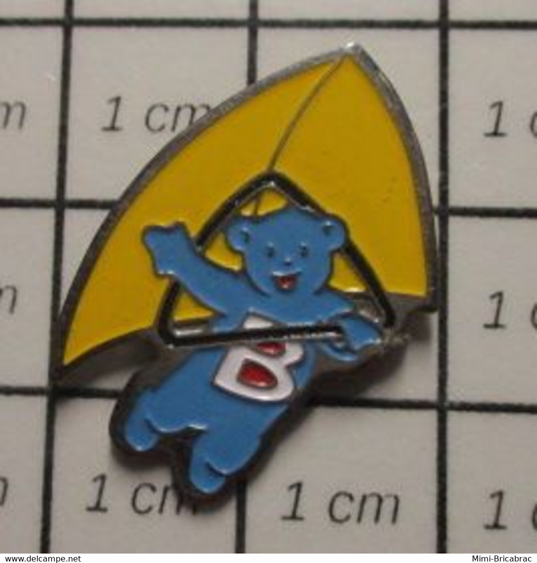 710a Pin's Pins / Beau Et Rare / THEME : ANIMAUX / OURS BLEU BUTAGAZ FAISANT DU DELTAPLANE - Animales